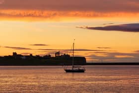 Admiring the view across to Tynemouth Priory.