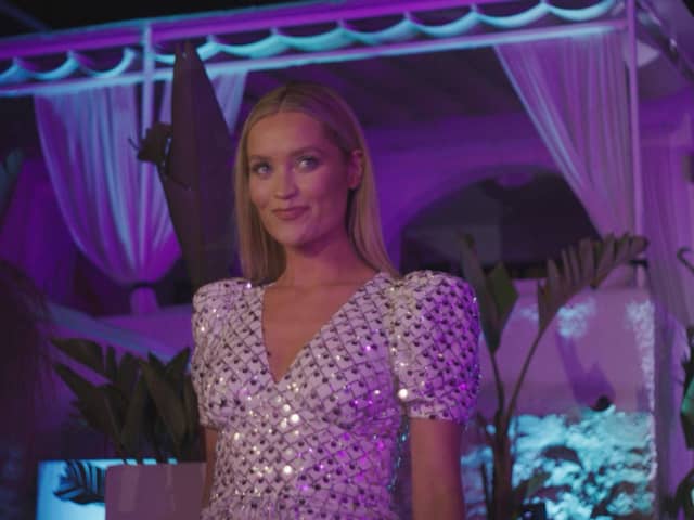 Love Island host Laura Whitmore arrives to kill the vibe at the VIP party with the result of the public vote (ITV)