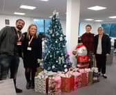 Staff from Active Care Group with the gifts for donating