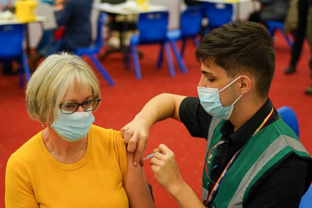 Booster vaccinations are available to book online or at a walk-in vaccination site. (Photo by Ian Forsyth/Getty Images)