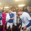 Chesterfield players celebrate inside the dressing room. Picture: Tina Jenner
