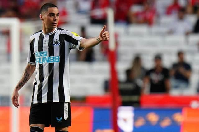 Miguel Almiron celebrates one of his goals against Benfica.