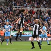 Newcastle United Women's captain Brooke Cochrane celebrates with Katie Barker (r) after scoring the second goal from the penalty spot during the FA Women's National League Division One North match against Alnwick Town Ladies at St James' Park on May 01, 2022 in Newcastle upon Tyne, England. (Photo by Stu Forster/Getty Images)