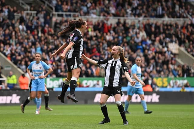 Newcastle United Women's captain Brooke Cochrane celebrates with Katie Barker (r) after scoring the second goal from the penalty spot during the FA Women's National League Division One North match against Alnwick Town Ladies at St James' Park on May 01, 2022 in Newcastle upon Tyne, England. (Photo by Stu Forster/Getty Images)