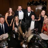 Guests were entertained by a comedian and a live band.