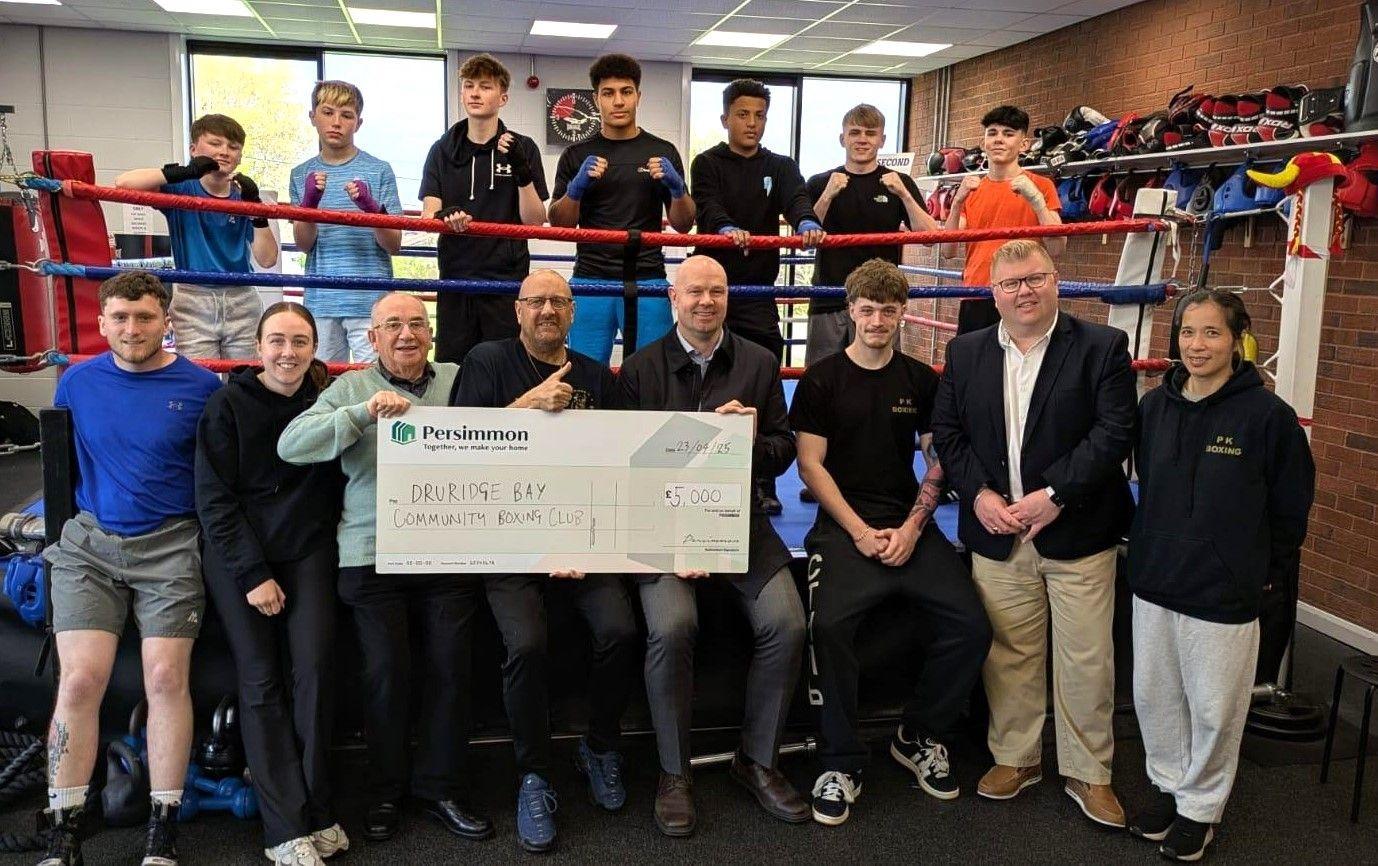 Boxing Club that ‘cultivates champions’ celebrates knock-out donation