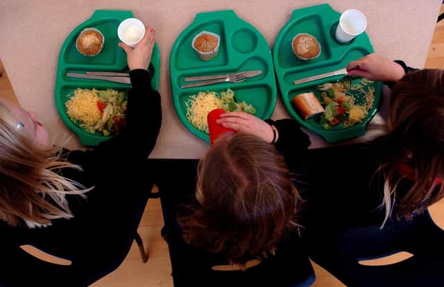 Pupils enjoying school dinners
