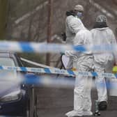 Forensic officers from Police Service of Northern Ireland (PSNI) at the sports complex in the Killyclogher Road area of Omagh