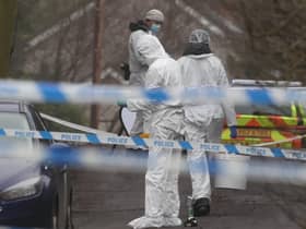 Forensic officers from Police Service of Northern Ireland (PSNI) at the sports complex in the Killyclogher Road area of Omagh