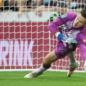 NEWCASTLE UPON TYNE, ENGLAND - AUGUST 25: Freddie Woodman of Newcastle United fails to save a penalty from Charlie Taylor of Burnley in the shootout during the Carabao Cup Second Round match between Newcastle United and Burnley at St. James Park on August 25, 2021 in Newcastle upon Tyne, England. (Photo by Ian MacNicol/Getty Images)