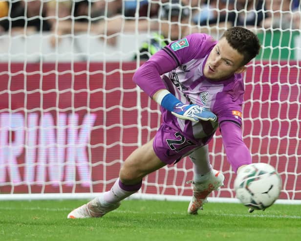 NEWCASTLE UPON TYNE, ENGLAND - AUGUST 25: Freddie Woodman of Newcastle United fails to save a penalty from Charlie Taylor of Burnley in the shootout during the Carabao Cup Second Round match between Newcastle United and Burnley at St. James Park on August 25, 2021 in Newcastle upon Tyne, England. (Photo by Ian MacNicol/Getty Images)