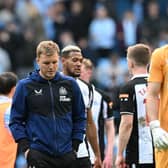 Newcastle United's English head coach Eddie Howe (L) and Newcastle United's Slovakian goalkeeper Martin Dubravka (R) leave the pitch after the English Premier League football match between Manchester City and Newcastle United at the Etihad Stadium in Manchester, north west England, on May 8, 2022. (Photo by PAUL ELLIS/AFP via Getty Images)