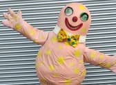 Complete with bow tie, toothy grin and green jiggling eyes, the 30-year-old costume was handmade for the BBC TV show Noel's House Party in the 1990s. Credit to eBay/mrwifey01