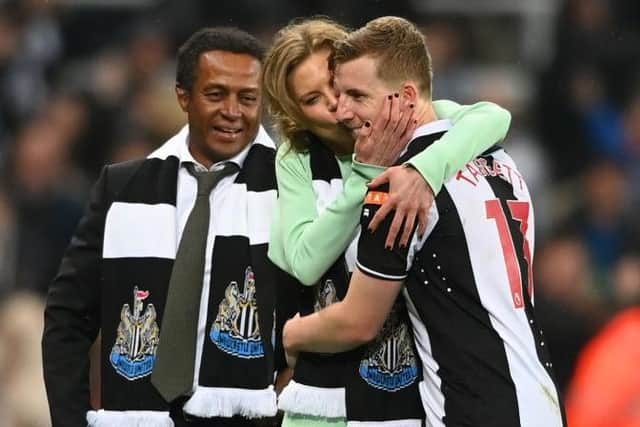 Amanda Staveley, Director of Newcastle United gives Matt Targett of Newcastle United a kiss following their victory in the Premier League match between Newcastle United and Arsenal at St. James Park on May 16, 2022 in Newcastle upon Tyne, England. (Photo by Stu Forster/Getty Images)