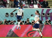 I'LL SECOND THAT: England's Bukayo Saka celebrates scoring the second goal against Group B rivals Iran with Declan Rice (right) at the Khalifa International Stadium. Picture: Nick Potts/PA