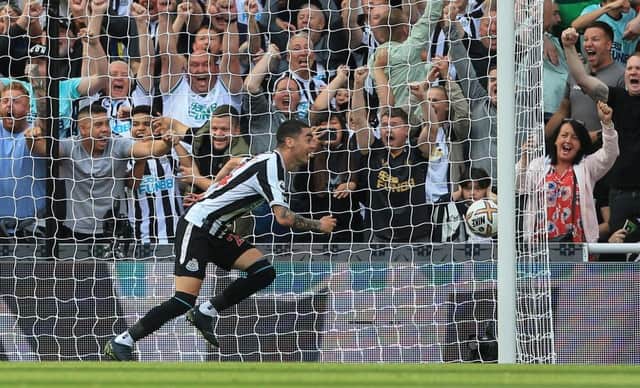 Newcastle United's Paraguayan midfielder Miguel Almiron celebrates after scoring his team first goal during the English Premier League football match between Newcastle United and Manchester City at St James' Park in Newcastle-upon-Tyne, north east England, on August 21, 2022. (Photo by LINDSEY PARNABY/AFP via Getty Images)