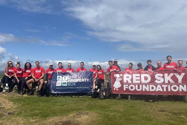 The My Property Box team enjoy a brief spell of sunshine on what was otherwise a wet and windy day