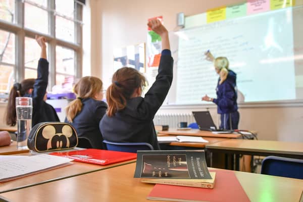 Children are freezing in cold classrooms, parents have warned.