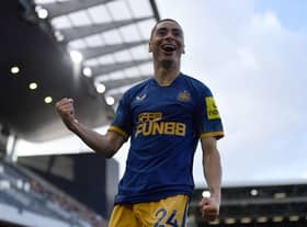 Miguel Almiron of Newcastle United celebrates after scoring their sides fourth goal during the Premier League match between Fulham FC and Newcastle United at Craven Cottage on October 01, 2022 in London, England. (Photo by Tom Dulat/Getty Images)