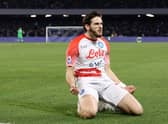 Khvicha Kvaratskhelia of SSC Napoli celebrates after scoring the 1-0 goal during the Serie A match between SSC Napoli and US Cremonese at Stadio Diego Armando Maradona on February 12, 2023 in Naples, Italy. (Photo by Francesco Pecoraro/Getty Images)