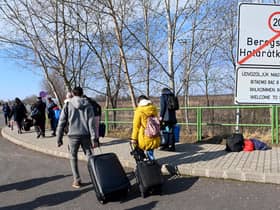 Ukrainians have left their homes in order to find safety across Europe. . (Photo by ATTILA KISBENEDEK / AFP) (Photo by ATTILA KISBENEDEK/AFP via Getty Images)