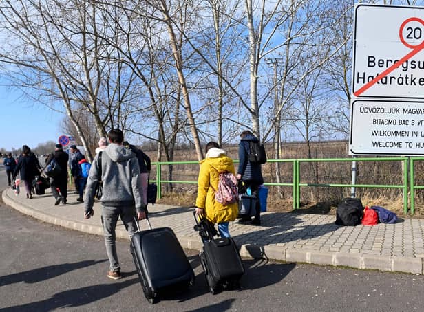 Ukrainians have left their homes in order to find safety across Europe. . (Photo by ATTILA KISBENEDEK / AFP) (Photo by ATTILA KISBENEDEK/AFP via Getty Images)