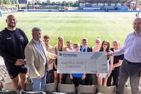 Young foundation players with representatives from the Foundation, the Falcons & Persimmon