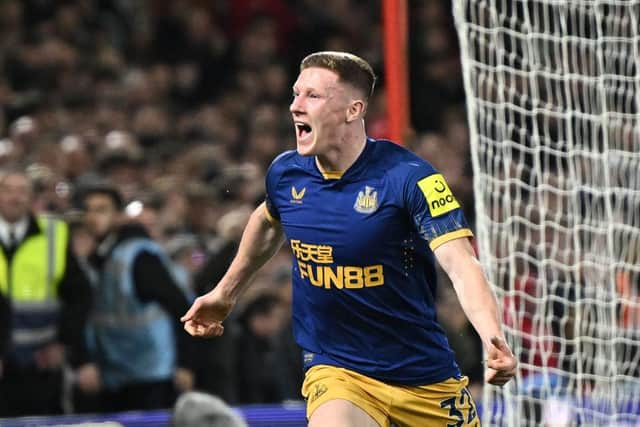 Newcastle United midfielder Elliot Anderson celebrates after scoring a goal at the City Ground which was later disallowed.