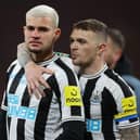 An emotional Bruno Guimaraes is consoled by Kieran Trippier after Newcastle United's Carabao Cup final defeat.
