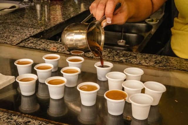 A stop to sample the unique taste of Cuban coffee during a food and cultural tour in Little Havana with Miami Culinary Tours. Image: Miami Culinary Tours