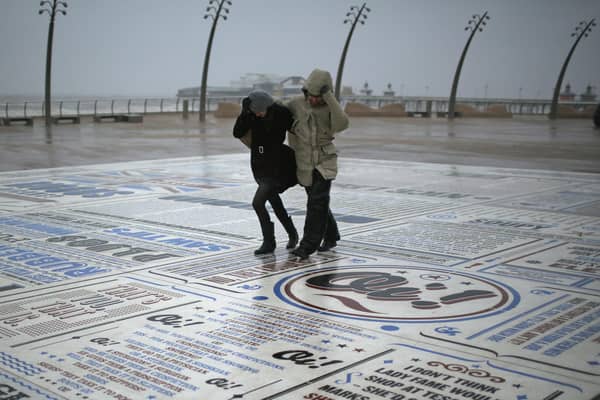 Walkers battle stormy weather.