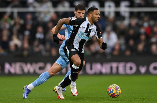 Callum Wilson of Newcastle in action during the Premier League match between Newcastle United  and  Manchester City at St. James Park on December 19, 2021 in Newcastle upon Tyne, England. (Photo by Stu Forster/Getty Images)