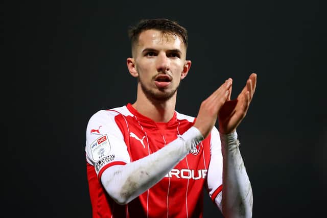 CAMBRIDGE, ENGLAND - DECEMBER 18: Dan Barlaser of Rotherham United celebrates towards the fans after the Sky Bet League One match between Cambridge United and Rotherham United at Abbey Stadium on December 18, 2021 in Cambridge, England. (Photo by Julian Finney/Getty Images)