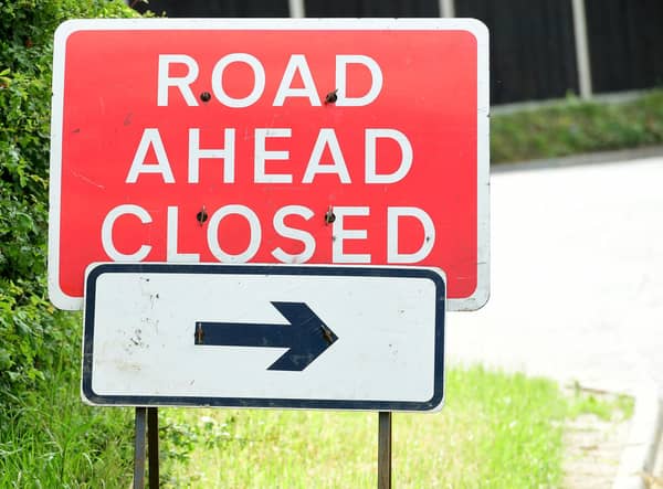 General view of a road ahead closed sign, London. 