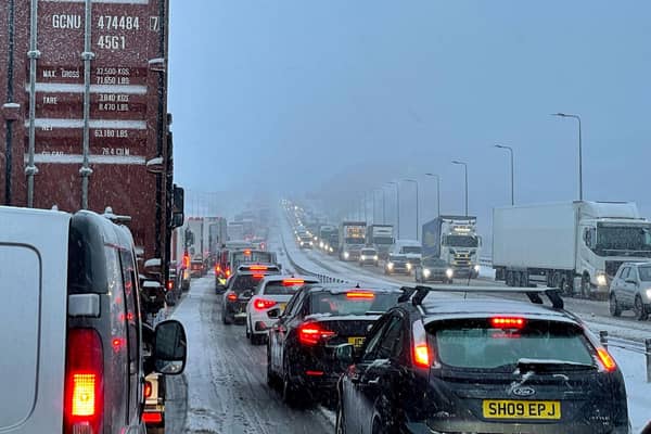 Traffic at a standstill on the M62 motorway near Kirklees, West Yorkshire, due to heavy snow in the area. (Photo credit: PA Wire)