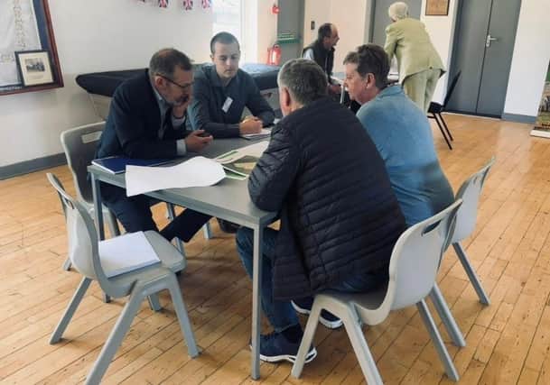 Members of the Banks Property team speaking to visitors at the Tudhoe consultation event