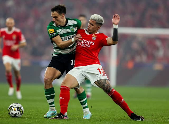 Benfica's Argentinian midfielder Enzo Fernandez (R) vies with Sporting's Uruguayan midfielder Manuel Ugarte during the Portuguese League football match between SL Benfica and Sporting CP at the Luz stadium in Lisbon on January 15, 2023. (Photo by CARLOS COSTA / AFP) (Photo by CARLOS COSTA/AFP via Getty Images)