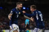 Scotland's Lyndon Dykes celebrates with Ryan Fraser after scoring to make it 2-0 during their UEFA Nations League match against Ukraine at Hampden Park. Photo by Craig Foy / SNS Group)