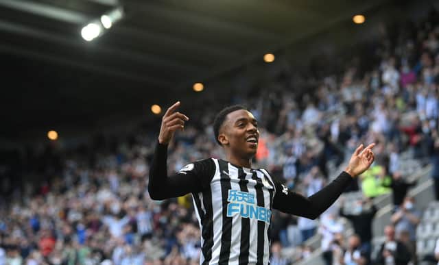 NEWCASTLE UPON TYNE, ENGLAND - MAY 19: Newcastle player Joe Willock celebrates after scoring the winning goal during the Premier League match between Newcastle United and Sheffield United at St. James Park on May 19, 2021 in Newcastle upon Tyne, England. (Photo by Stu Forster/Getty Images)