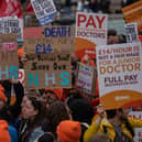 Junior doctors take part in a rally in Trafalgar Square during a nationwide strike on April 11, 2023 in London. Junior doctors in England are held a 96-hour walkout hoping to achieve full pay restoration after seeing their pay cut by more than a quarter since 2008. (Photo by Carl Court/Getty Images)