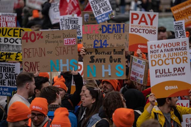 Junior doctors take part in a rally in Trafalgar Square during a nationwide strike on April 11, 2023 in London. Junior doctors in England are held a 96-hour walkout hoping to achieve full pay restoration after seeing their pay cut by more than a quarter since 2008. (Photo by Carl Court/Getty Images)