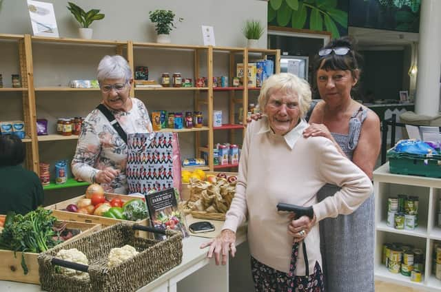 Local resident, Mrs Robinson, visiting the Nourish Store at Cedarwood Trust