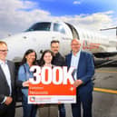 Nick Jones CEO Newcastle Airport, Goro, Emma and Stephen Pattie and Luke Farajallah CEO Loganair