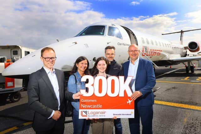 Nick Jones CEO Newcastle Airport, Goro, Emma and Stephen Pattie and Luke Farajallah CEO Loganair