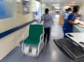 File photo dated 18/01/23 of a general view of staff on a NHS hospital ward, as England's hospitals have been hit by hundreds of sewage leaks in the last year, records detailing patients slipping on water and ceiling tiles falling down have revealed.