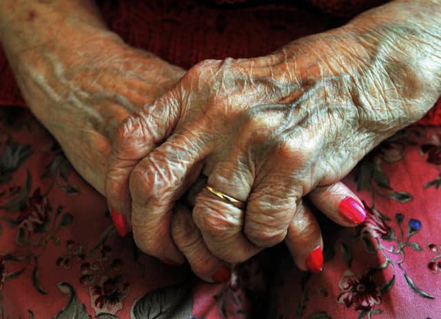 File photo dated 05/12/08 of the hands of a resident at a nursing home as the Government is 'woefully underprepared' for the consequences of a rapidly ageing society in England, a House of Lords committee warned.