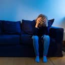 PICTURE POSED BY MODEL A woman showing signs of depression.
