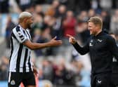 Joelinton of Newcastle United celebrates victory with Eddie Howe, Manager of Newcastle United following the Premier League match between Newcastle United and Brentford FC at St. James Park on October 08, 2022 in Newcastle upon Tyne, England. (Photo by Stu Forster/Getty Images)