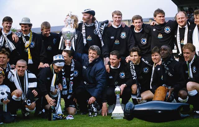 Newcastle United manager Kevin Keegan holds the League Division One trophy after the League Division One match against Leicester City at St James' Park on May 9, 1993 in Newcastle, England,( Back row left to right) Paul Bracewell, Terry McDermott (Assistant manager) Mark Robinson, Barry Venison (obscured) Brian Kilcline, Tommy Wright, Kevin Sheedy, Derek Fazackerley (coach) Derek Wright (physio) and Scott Sellars, (front row left to right) John Beresford, Lee Clark, David Kelly, Steve Howey (partially obscured) KK, Liam O' Brien, Gavin Peacock, Robert Lee, Andy Cole and Kevin Scott.