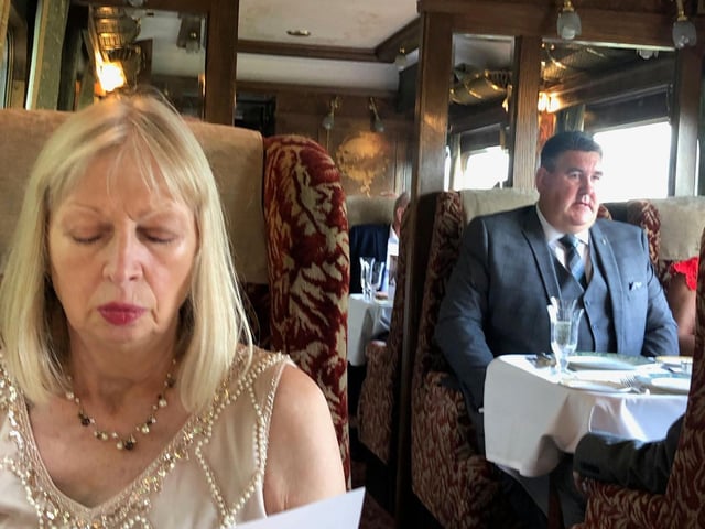 What's for dinner ... passengers peruse the menu on the Northern Belle train